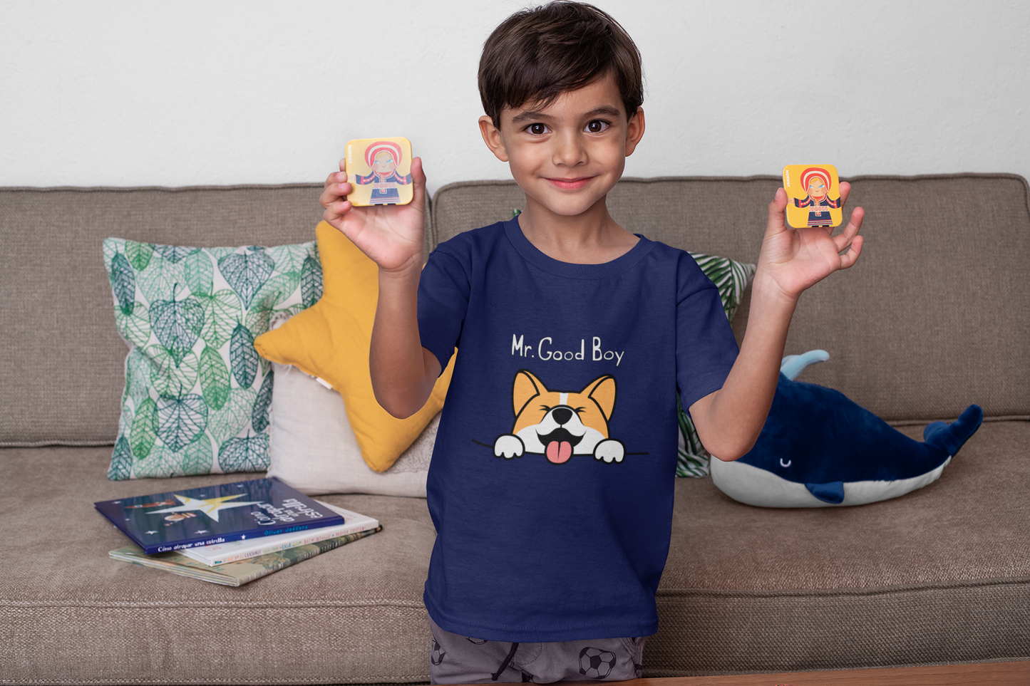 
                  
                    boy wearing mr good boy tshirt navy blue with toys floof
                  
                